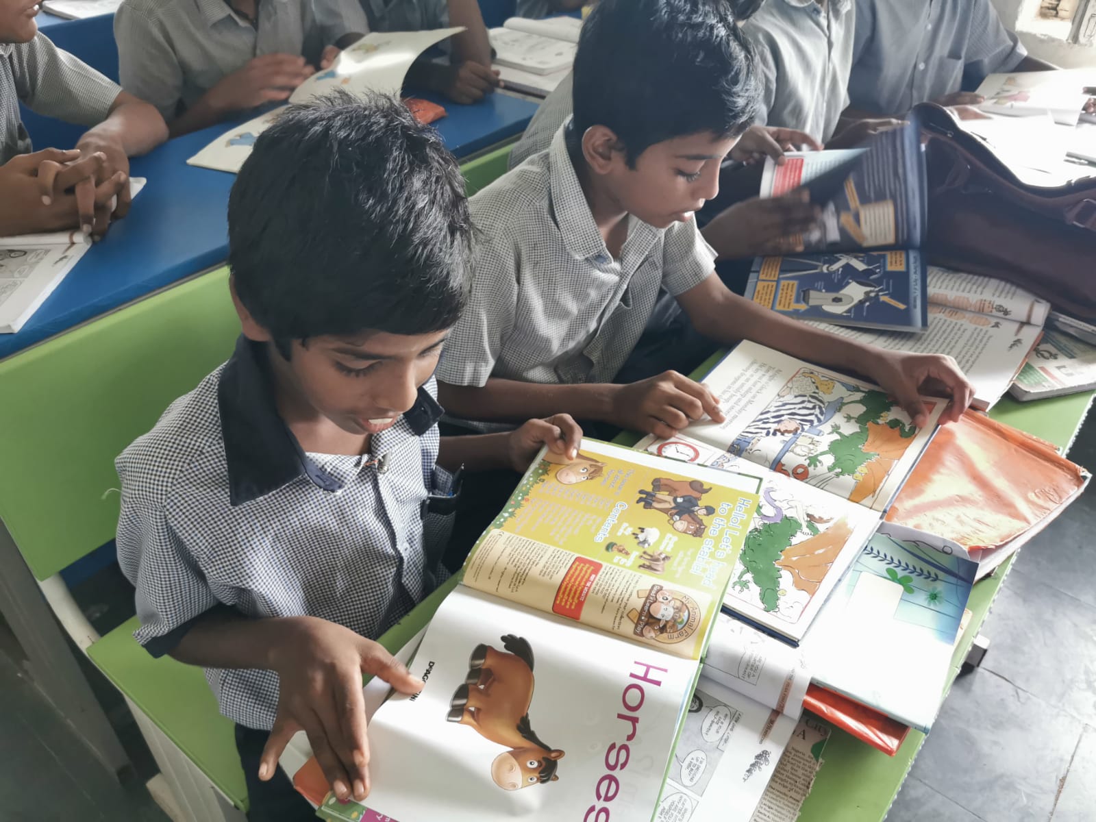 Child smiling after receiving a book